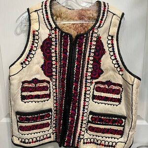 Vintage Native sheep wool shearling vest with embroidered leather and pockets.